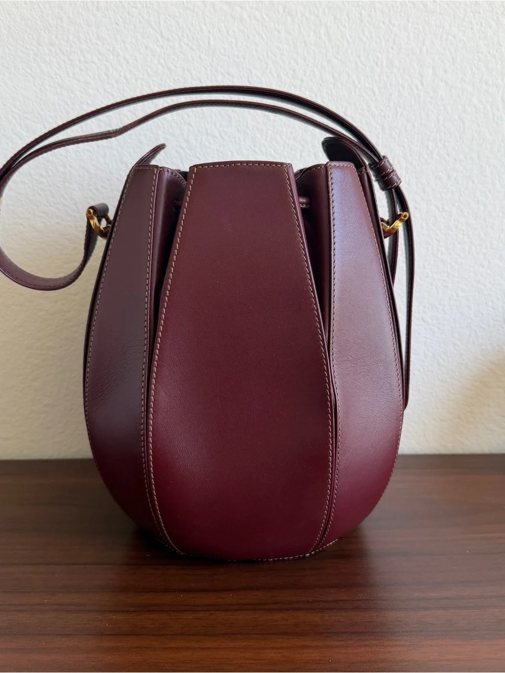 Leather Cartier Drawstring Bucket Bag in Deep Burgundy
